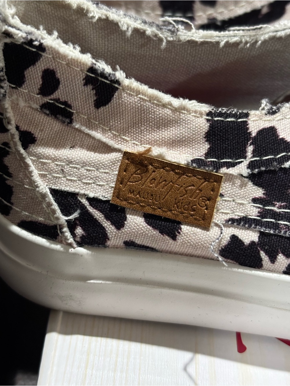 Blowfish Kids Black and Cream Slip-On Cow Print Sneakers - Picture 6 of 7